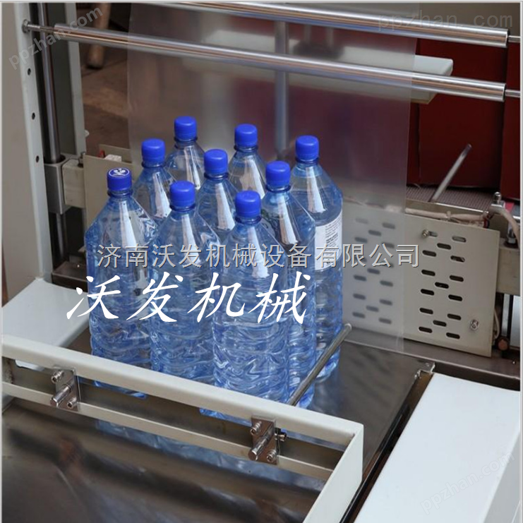宿州玻璃水包装机|PE膜热收缩包装机|袖口式自动套膜机厂家-沃发机械
